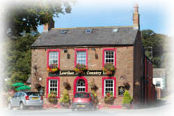 A photograph of the front of the Lowther Arms Country Inn